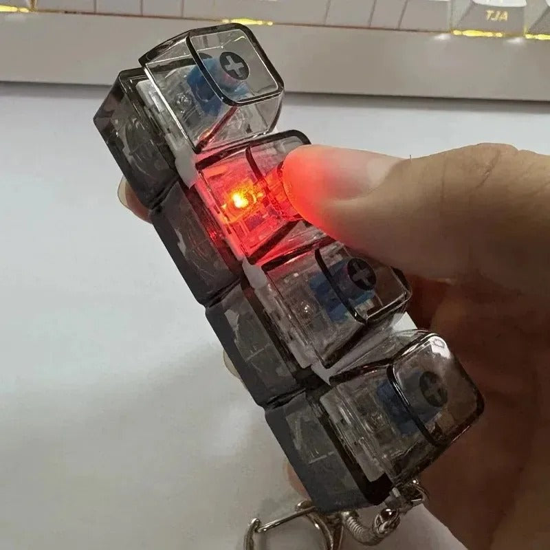 CalmaClick® – Llavero Antiestrés RGB para Calmar la Ansiedad al Instante