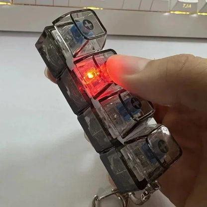 CalmaClick® – Llavero Antiestrés RGB para Calmar la Ansiedad al Instante